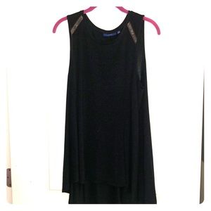 Tank with embellishment